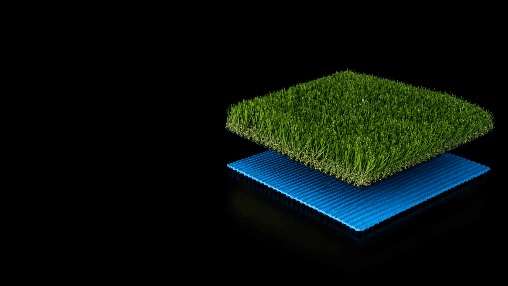 TurfIt turf blades separated above the blue permeable backing layer, showing the engineered construction system
